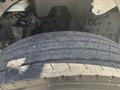 Close-up of a truck tire showing detailed tread patterns on a Freightliner M2 106