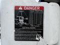 A warning label on a 2015 Freightliner M2 detailing electrical hazards and safety precautions for electrical work