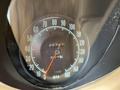 Speedometer of a 1970 Chevrolet Corvette showing a reading of 20787 miles with a needle pointing just below 90 miles per hour