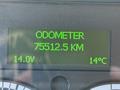 Digital display showing the odometer reading of 75512.5 KM with power level at 14.0V and temperature at 14°C