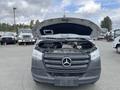 A 2025 Mercedes-Benz Sprinter van with its hood raised showing the engine compartment