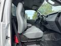 Side view of the interior of a 2018 Ford F-750 showing the driver's seat and dashboard with a simple grey design