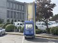 A 2023 Bitimec SC415, compact and enclosed, with a blue and clear cover, designed for outdoor maintenance or cleaning tasks