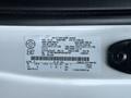 2023 Ford F-250 truck with vehicle identification label displaying specifications and manufacturing details