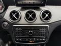 The interior dashboard of a 2016 Mercedes-Benz GLA-250 featuring air vents a control panel and multimedia display