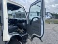 A 2019 Hino 195 truck with an open driver's door displaying the cabin interior including the steering wheel and dashboard