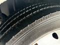 Close-up of a tire tread on a 2014 International TerraStar showcasing the design and depth of the grooves