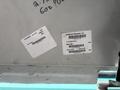 A close-up view of a 2020 Freightliner MT45 with identification and serial number labels attached to its side