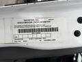 A label on a 2020 International MV607 detailing vehicle emissions control information and compliance with regulations for heavy-duty vehicles