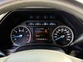Dashboard of a 2021 Ford F-250 SD showing speedometer, tachometer, and engine information display
