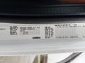 A 2016 Freightliner 108SD truck specification label displaying details such as vehicle identification number weight distribution and axle information