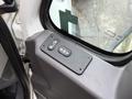 Close-up of the power window control panel showing buttons for operating the window of a 2012 International 7400