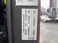 Label attached to a 2006 E-One Typhoon detailing suitable tire rim choices and tire size specifications for front and rear wheels