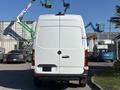 A 2021 Mercedes-Benz Sprinter 2500 van seen from the rear showcasing a white exterior and no visible license plate
