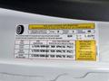 A 2021 Ford Transit-350 tire and loading information label displaying seating capacity tire specifications and recommendations for pressure