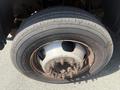 A close-up of a tire and wheel assembly from a 2016 RAM 5500 showing the tread pattern and wheel bolts