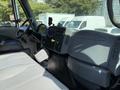Interior view of a 2006 International 7500 with a dashboard featuring gauges and controls including a radio and air conditioning system