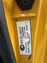 Label on the interior of a vehicle showing details like the manufacturer's name and color specifications for a Micro Bird model from 2021 Ford Econoline