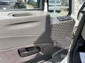 Interior door panel of a 2012 International 7300 Workstar with controls for windows and locks visible