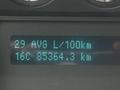 Dashboard display of a 2011 Ford F-250 SD showing average fuel consumption and distance traveled