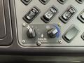 Control panel featuring knobs and switches for air controls on a 2022 Freightliner B2 vehicle