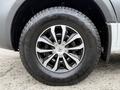 A close-up view of a 2019 Mercedes-Benz Sprinter's alloy wheel featuring a multi-spoke design and a rugged tire with a detailed tread pattern