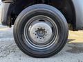 Close-up of a gray wheel from a 2010 Ford F-450 showing the rim and tire details