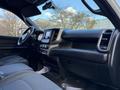 Interior view of a 2021 RAM 5500 with a focus on the dashboard and seating area featuring a central touchscreen display and modern controls