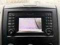 Dashboard display of a 2017 Mercedes-Benz Sprinter showing a rearview camera with parking guidelines