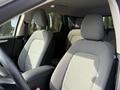 Interior view of a 2020 Ford Escape featuring two front seats with patterned gray upholstery and a black steering wheel