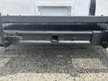 A rear view of a 2011 Workhorse W62 showing a black hitch receiver and bumper with a textured finish