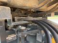 Close-up of the hydraulic system of a 2020 Hyundai HR110C showing pipes and connectors with dirt and grime buildup