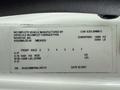A vehicle identification label for a 2022 International MV607 showing specifications such as axle configuration weight ratings and assembly location