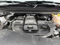 A 2024 RAM 5500 engine with a turbo diesel badge showing exposed components and engine details