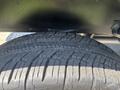 Close-up of a tire tread from a 2017 Chevrolet Colorado showing detailed grooves and patterns designed for traction and performance
