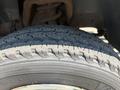 Close-up of a treaded tire from a 2011 Dodge Ram 5500 showing detailed texture and design