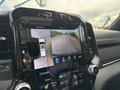 Interior display of a 2021 RAM 1500 showing a rearview camera with top view and control options for heated seats