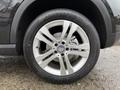Close-up of a 2016 Mercedes-Benz GLA-250 wheel showcasing a silver alloy rim and a black Aggressor Z200 tire