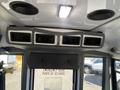 Interior view of a 2020 Chevrolet Express with overhead air vents and speakers visible