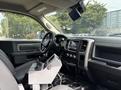 Interior of a 2016 RAM 5500 featuring a modern dashboard display control panel and various controls for driver operations