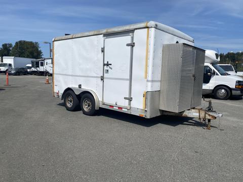 A white 2008 Wells Industries Inc EW1422 trailer with a side door and a metal storage box attached to the rear on a dual axle setup