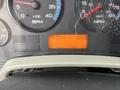 Dashboard of a 2013 International DuraStar 4300 showing gauges for RPM speed and hours with an orange display indicating 2391 hours