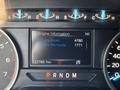 Dashboard of a 2019 Ford F-150 displaying engine information including engine hours and mileage