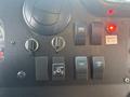 Panel with switches and knobs for lights fans and defrost in a 2018 Ford Econoline van