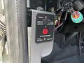 A close-up view of an inverter remote control panel from a 2012 International 7300 Workstar featuring status indicators and a push button for on and off functions