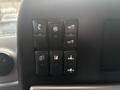 Control panel featuring six black toggle switches with various symbols indicating different functions like lights, hazard lights, and engine diagnostics
