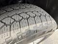 Close-up of a tire tread on a 2018 Chevrolet Silverado 1500 showing the detailed pattern and texture of the rubber surface