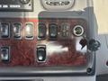 Close-up of the control panel inside a 2022 Freightliner M2 106 featuring various switches USB ports and a power outlet