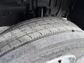 Close-up of a worn tire from a 2018 Hino 195 showing tread patterns and sidewall details