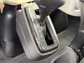 Gear shift lever of a 2010 International 4300 with markings for reverse neutral and drive settings